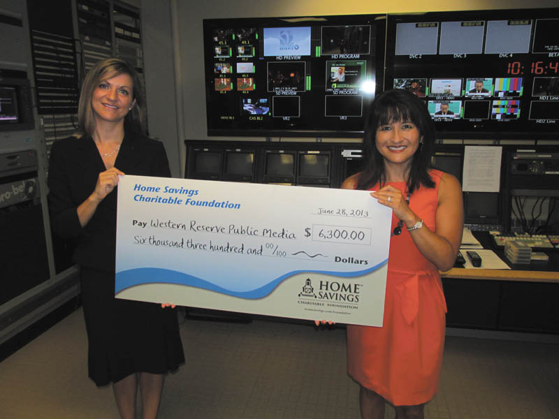 SPECIAL TO THE VINDICATOR
Home Savings Charitable Foundation has donated $6,300 to Western Reserve Public Media to support such PBS shows as “Masterpiece” and “Sesame Street.” Above are Jennifer Muren, North Central Area sales manager, Home Savings, at left; and Toni Kayumi, chief business development officer of Western Reserve Public Media.
