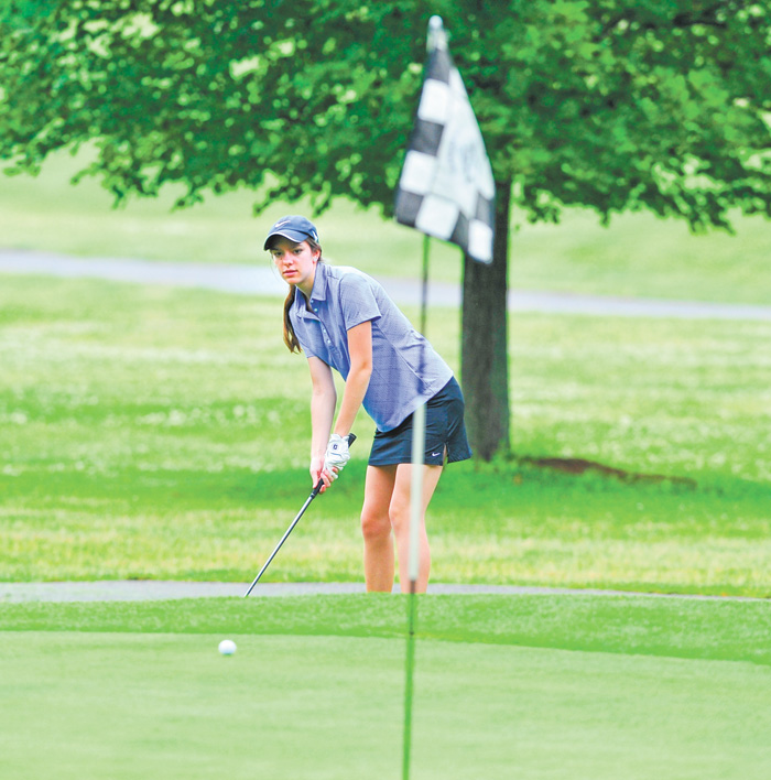 Bailey Hardick of Canfield watches her ball break toward the cup after a chip shot on the seventh hole at Diamond Back Golf Course during Monday’s junior qualifier for the Greatest Golfer of the Valley tournament. 