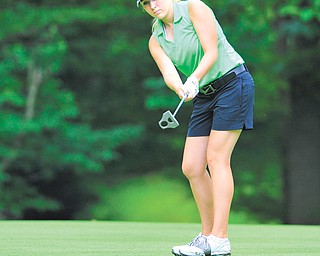 Alexa Tringhese of Columbiana watches her ball break toward the cup on the 14th hole at Diamond Back Golf Course in Canfield during Monday’s junior qualifier for the Greatest Golfer of the Valley tournament.