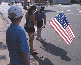 Here is a photo of David Dull watching the Hubbard Founder's Day Parade in July 2011. Photo submitted by Marla D'Andrea-Dull.