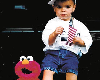 Corey Purcell of Dublin, Ohio, taken July 4, 1997. Corey graduated from high school June 8, 2013. Submitted by his grandmother, Janet Murray of Canfield.
