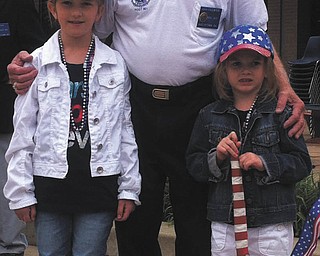 Elisabeth and Madeline Facemyer of Canfield, with John Facemyer of Austintown, their grandfather and a veteran. Submitted by Dr. Gregory J. Facemyer.