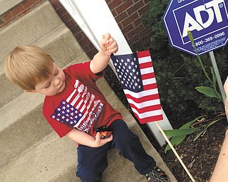 This is Cole Steiner planting a flag by the steps. He was two in this photo (12-31-10) and lives in North Canton, Ohio. His parents are Zak and Arin Steiner, originally from Girard and Champion. Sent by grandmother, Sharon Johnston of Austintown.
