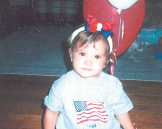 Molly Bury of Liberty, was one-year old when this photo was taken by her papa, Red Pallante of Liberty.