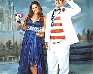 Dominic DeAngelo and Jessica Miller, both of Youngstown, salute America at Cardinal Mooney High School senior prom. Sent by Greg and Maribeth DeAngelo.