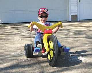 Troy Sudimak, 4, is getting ready for the "Firecracker 400" as he races at his grandparents, Rodney and Jeanne Sudimak's home.