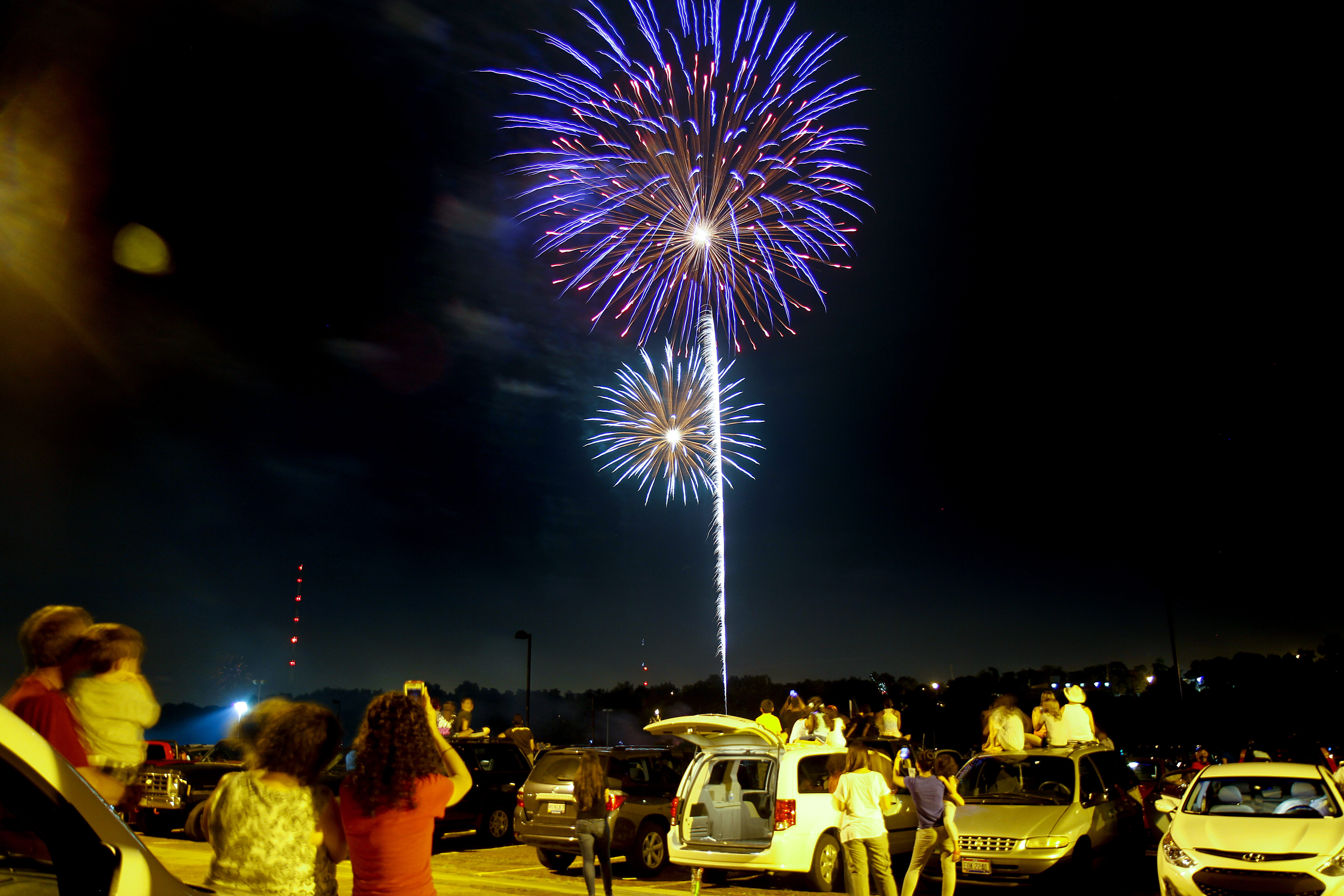 MADELYN P. HASTINGS | THE VINDICATOR

Spectators fill the streets and parking lots of downtown Youngstown to watch the firework display shot from the Covelli Centre on July 4, 2013.