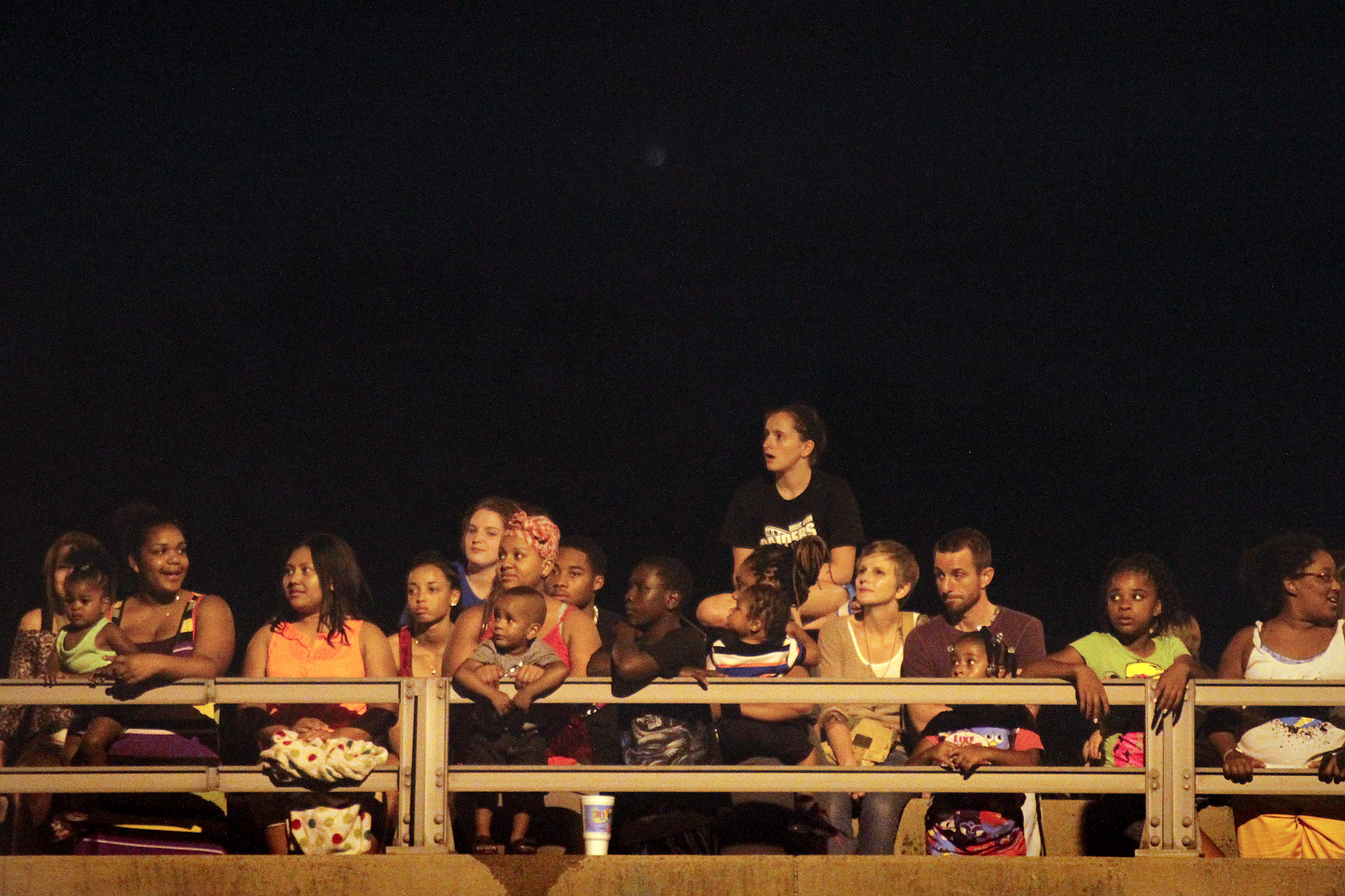 MADELYN P. HASTINGS | THE VINDICATOR

Spectators fill the streets and parking lots of downtown Youngstown to watch the firework display shot from the Covelli Centre on July 4, 2013.