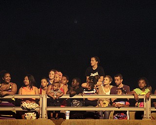 MADELYN P. HASTINGS | THE VINDICATOR
Spectators fill the streets and parking lots of downtown Youngstown to watch the firework display shot from the Covelli Centre on July 4, 2013.