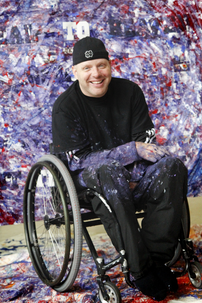 MADELYN P. HASTINGS | THE VINDICATOR

Jeff Sanders uses his wheelchair to make a painting. He will sell it in a couple of months and donate money to the  Warren Family Mission. He’s a recovering addict himself and has been staying at the mission.