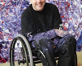 MADELYN P. HASTINGS | THE VINDICATOR

Jeff Sanders uses his wheelchair to make a painting. He will sell it in a couple of months and donate money to the  Warren Family Mission. He’s a recovering addict himself and has been staying at the mission.