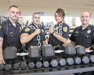 Youngstown police officers who recently passed the department’s voluntary physical-fitness program include, from left, Lt. Frank Rutherford, Patrolman Nick Bailey, Patrolwoman Jessica Shields and Patrolman George Anderson