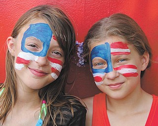 Maddie Fall and Anna Buffone (Leetonia) are at the Columbiana Fourth of July celebration last year. The photo was taken by Nicole Buffone.