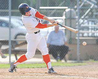 Astro batter Brenden Wells makes contact during his team’s 8-4 victory over Creekside Fitness at Cene Park on Sunday.