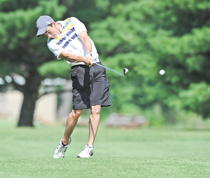 Corey Antinone of Howland drives his ball from the fairway and toward the green on the 10th hole at Tamer Win in Cortland.