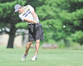 Corey Antinone of Howland drives his ball from the fairway and toward the green on the 10th hole at Tamer Win in Cortland.