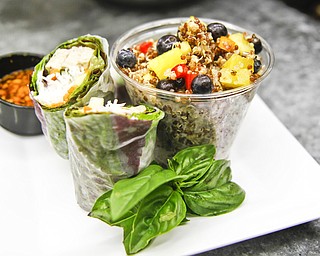 Fresh spring rolls served with quinoa salad at Ely’s To Go in Youngstown.