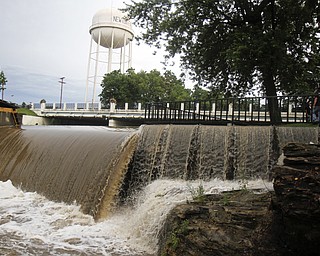 MADELYN P. HASTINGS I THE VINDICATOR
The dam near Veteran's Park in Newton Falls over the west branch of the Mahoning River suffered from major flooding after a storm on July 10, 2013.