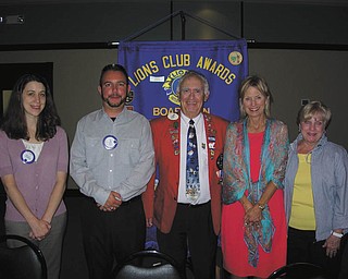 SPECIAL TO THE VINDICATOR
At the Boardman Lions Club’s 45th charter anniversary dinner June 20, District Governor John Woodside installed four new members. Pictured with Woodside (center), they are, from left, Megan and Matt Gambrel, Ann Kravitz and Jane Cornelius. For information visit Boardman Lions Club on Facebook or www.boardmanlions.com or email boardmanlions@hotmail.com.