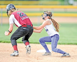 Poland infielder Brooke Bobbey tags out Boardman baserunner Emma Ericson, who was attempting to steal second base in the bottom of the sixth inning of Monday’s game at Fields of Dreams.