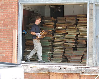 About 130 boxes worth of records stored in the Trumbull County Archives were damaged as a result of a sewer backup caused by last Wednesday’s rainstorm. The basements of the Wean Building, North Park Avenue, above, and the nearby Stone Building were flooded Wednesday.