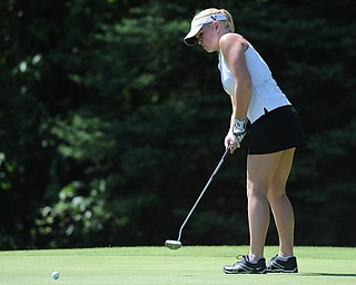Rachel Williamson of Austintown follows through on her putt as it rolls toward the hole on the 8th hole Friday morning at Tamer Win in Cortland. 