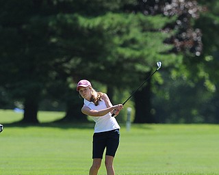 Nadya Stratton of Boardman chips her ball from the short rough and toward the green on the 8th hole Friday morning at Tamer Win in Cortland.