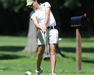 Alexis eddy of JFK Friday morning tees off on the 11th hole Friday morning at Tamer Win in Cortland.