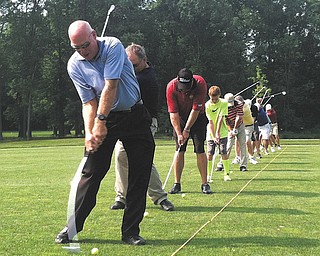 Dennis Miller, Mill Creek Park Golf Course golf pro and executive director, and nine others teed off Wednesday
at the course’s new practice range. The facility is open to the public, but also will be utilized to teach Mahoning
Valley youth.