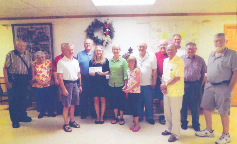 SPECIAL TO THE VINDICATOR: The Canfield Odd Fellows Lodge presented a scholarship to Rachel Jenkins on June 12 at a lodge meeting. She will attend Malone College. Above from left are Everett McCreary; Evelyn McCreary; Al Thompson; John Weaver; Rich Eberth; Rachel; Sara Jenkins, Rachel’s mother; Joy Jenkins, her sister; Sparky Ashby; Howard Young; George Makar; Don Habeger; Lloyd Schooley; and Jack Barton. The Odd Fellows have been in Canfield since 1850 and have given scholarships for the past eight years.