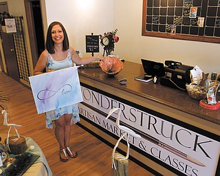 Stephanie Miller, a Youngstown State University graduate, is owner of Wonderstruck Artisan Market & Classes that recently opened in Canfield. Handmade jewelry, artwork and decor are just some of the items sold at Wonderstruck.