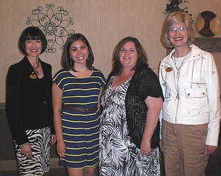 SPECIAL TO THE VINDICATOR: 
The Yo-Mah-O Chapter of the International Association of Administrative Professionals awarded two $1,000 scholarships at its June 11 meeting at A La Cart Catering in Canfield. Above from left are Laura Malloy, co-chairwoman of the scholarship committee, who conducted the ceremony; Courtney Yourchisin and Kathy Compston, who received the awards; and Denise Altman, who is a committee member. Yourchisin, of Brookfield, attends Youngstown State University and majors in human resource management. Compston, of Warren, is a Trumbull Business College student studying for an associate degree in applied business and office administration.