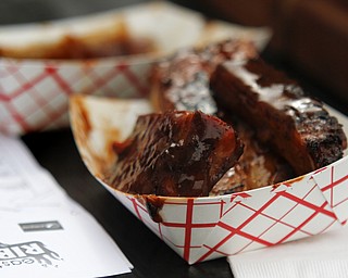 MADELYN P. HASTINGS | THE VINDICATOR

A serving of ribs at at the Eastwood Rib Fest in Niles on Saturday, July 20. The event runs through Sunday.