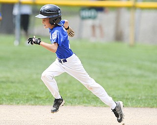 Poland base runner #24 Thomas Fire sprints to second base to leg out a double during the 2nd inning.