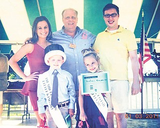 SPECIAL TO THE VINDICATOR
Trumbull County Fair’s Little King and Queen smile shyly after receiving their crowns. Brock Pierce, 6, of Cortland was crowned Little King. Brock is the son of Erin and David Pierce. Anastasia Komissarov, 7, was crowned Little Queen. She’s the daughter of Nicole Komissarov and Karl Shaffer.