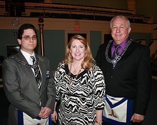 SPECIAL TO THE VINDICATOR: Wick Lodge 481 of Youngstown sponsored a fundraising dinner earlier in the summer and raised more than $1,600. The money was donated to Boys and Girls Club of Youngstown. From left are Michael Masterbaradino, master of Wick Lodge; Rachel Kerns, representing Boys and Girls Club; and Gary Shane, senior warden of the lodge.