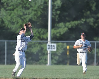 astro infielder #17 Brendan Cox gets under a fly ball for the out to end the inning. Teammate #20 Brenden Wells is behind him. 