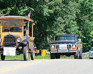 Dylan Crump’s modified Model T carries his coffin from the funeral home to the cemetery, with more than 40 vehicles following. Mary Crump, Dylan’s mother, said most of the cars in the procession had been worked on by her son.