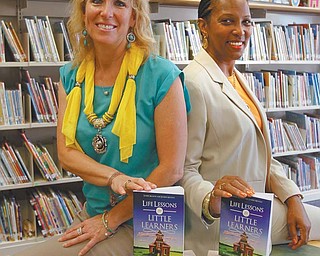 Louise Mason, left, and Janine Motley wrote “Life Lessons for Little Learners: Beginning Steps Toward Academic Success,” which will be in bookstores in September. Mason has been a teacher and principal for 28 years, now working in the Girard school district. Motley retired after 35 years with Liberty schools and three years at Youngstown State University.