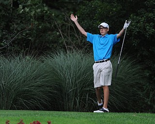 Daniel LaPolla of Warren reacts after a bad tee shot on a hole on the back 9 Sunday afternoon at Trumbull Country Club.
