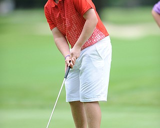 Joey Shushok of Fitch follows through on his putt on a hole on the back 9 Sunday afternoon at Trumbull Country Club.