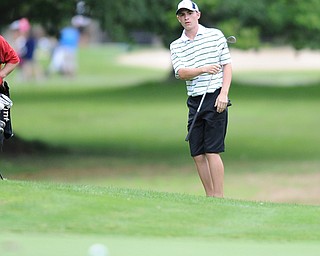 Bradley Miller reacts after a bad chip shot on a hole on the back 9 Sunday afternoon at Trumbull Country Club.