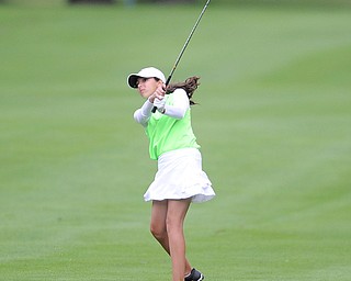 Hadley Spielvogel follows through on her back swing on her approach shot on a hole on the back 9 Sunday afternoon at Trumbull Country Club.