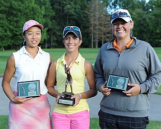 Christina Cooper, center, stands with Jacinta Pikunas, left, and Kaylee Neumeister. Cooper won first place in the Girls 15-17 finals of the 2013 Greatest Golfer of the Valley presented by Farmers National Bank at Trumbull Country Club. Pikunas, the 2011 champ, took second. Neumeister, the 2012 12-14 champ, won third.