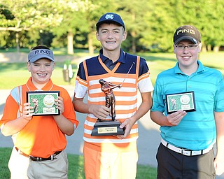 Ken Keller, center, won the 12-14 boys division Sunday of the 2013 Greatest Golfer of the Valley presented by Farmers National Bank at Trumbull Country Club. Cole Christman, left, won second in a scorecard playoff over Zach Jacobson, who took third.