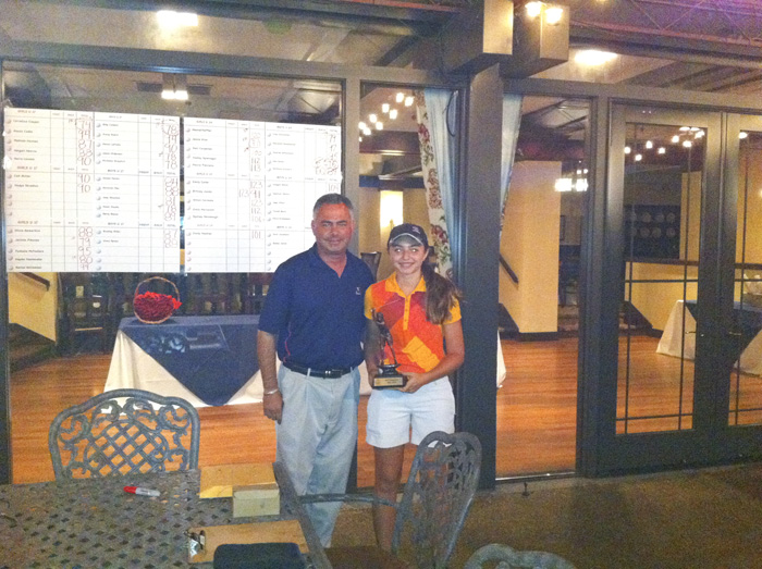 Jenna Vivo stands with Trumbull Country Club Head Pro John Diana after winning the 12-14 girls division of the Greatest Golfer of the Valley presented by Farmers National Bank played Sunday, July 28, 2013.