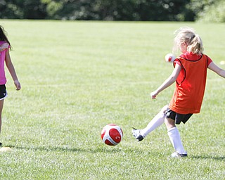        ROBERT K. YOSAY  | THE VINDICATOR

Learning to pass the ball -Leila Faming 6 of Austintown and Sarah Schaller 8 of boardman (red)  pass the ball back and forth 

British soccer camp   Wick Recreation Area of MillCreek Park week-long soccer camp focuses on building skills to play the game along with sportsmanship