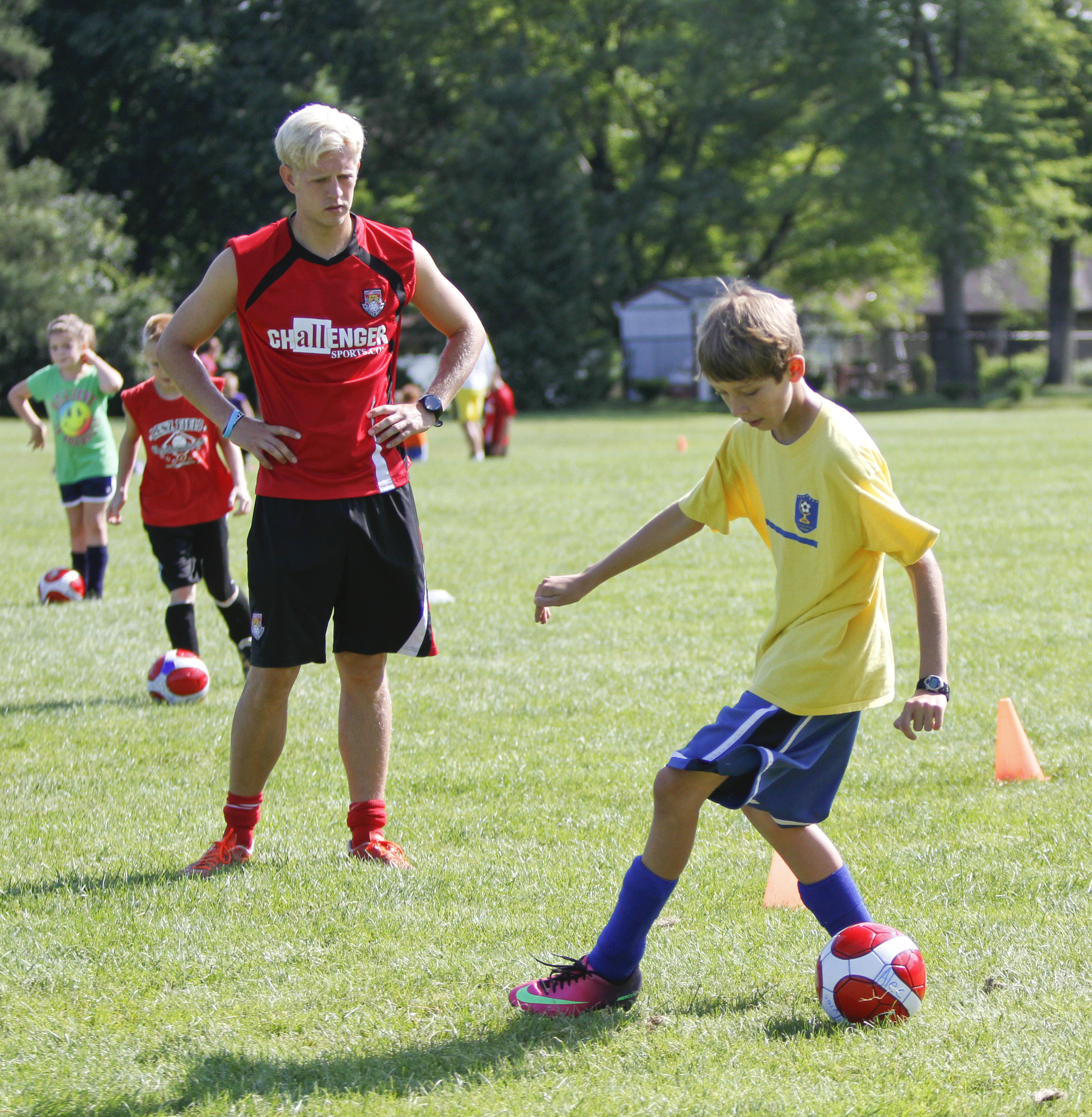       ROBERT K. YOSAY  | THE VINDICATOR

Simon Slater watches as Alec DeBaldo 12 of Austintown   move the ball down the field

British soccer camp   Wick Recreation Area of MillCreek Park week-long soccer camp focuses on building skills to play the game along with sportsmanship