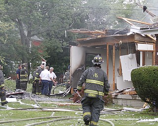        ROBERT K. YOSAY  | THE VINDICATOR

The house at 535 Cohasset Drive was vacant but the house next door at 539 Cohasset is damaged. In addition, at least four homes across the street from the blast had windows that were broken by the force of the explosion. 