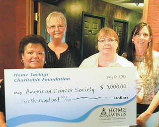 SPECIAL TO THE VINDICATOR
Home Savings Charitable Foundation has donated $5,000 to the American Cancer Society. The funds helped to defray the expense of the Ladies Pink Ribbon Golf Tournament, which took place July 15 at Squaw Creek Country Club. From left are Kathy Antonelli, executive assistant at Home Savings; Patty Barber, event honoree, retirement distribution, Home Savings; Cheryl Miskell, 2013 event chairwoman; and Pamela Berry, director of Home Savings Charitable Foundation.

